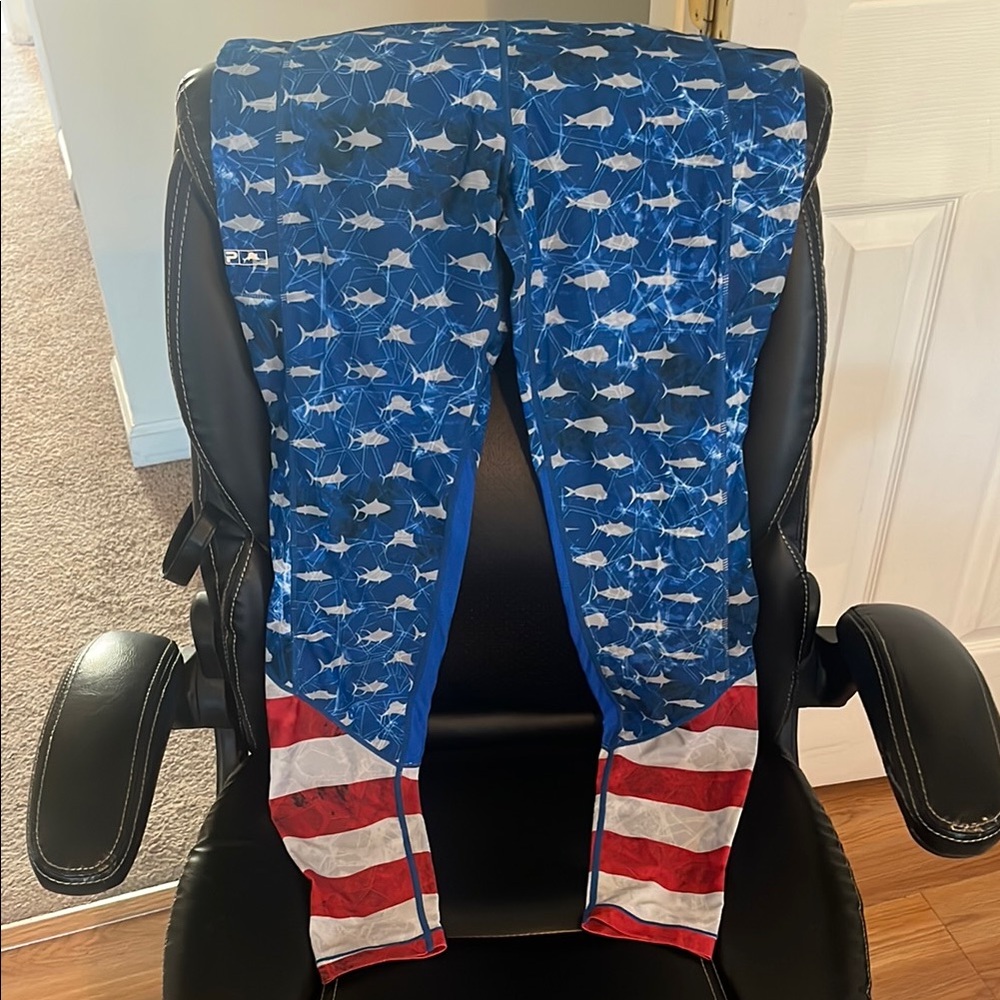 Pelagic. Size large. fish, red white & blue leggings